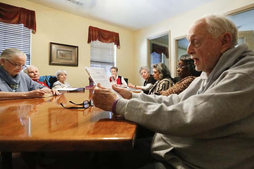 David Fletcher , 86 (right), reads his latest work to the group of six to 10 writers who...