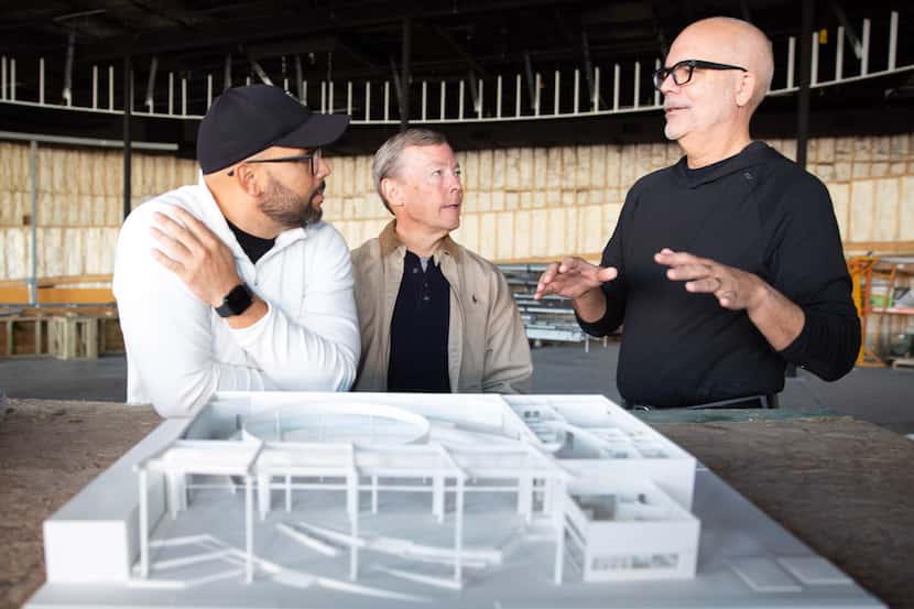 Kevin Gimenez (left), Bryce Johnson (middle) discuss plans for the new Upperroom church with...