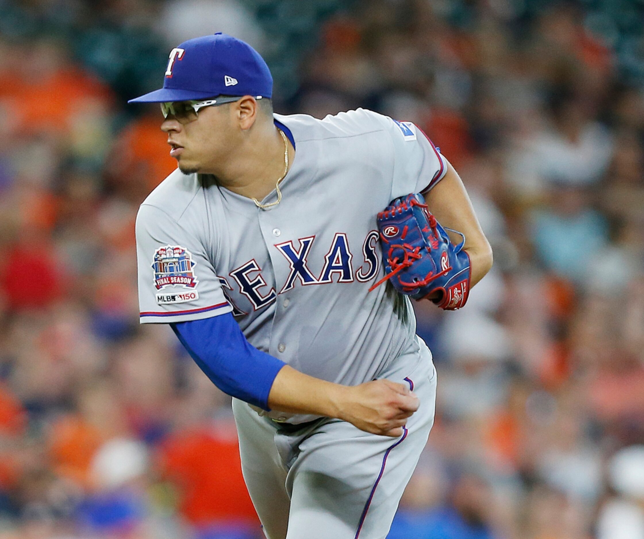 HOUSTON, TEXAS - JULY 20: Ariel Jurado #57 of the Texas Rangers pitches in the first inning...