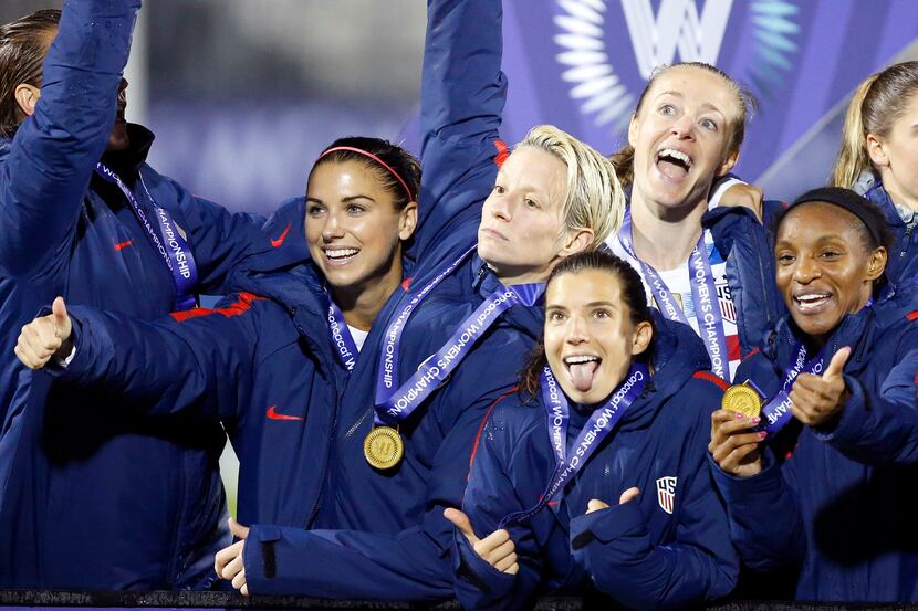 The U.S. Women's soccer team celebrates their win over Canada in the CONCACAF Women's...