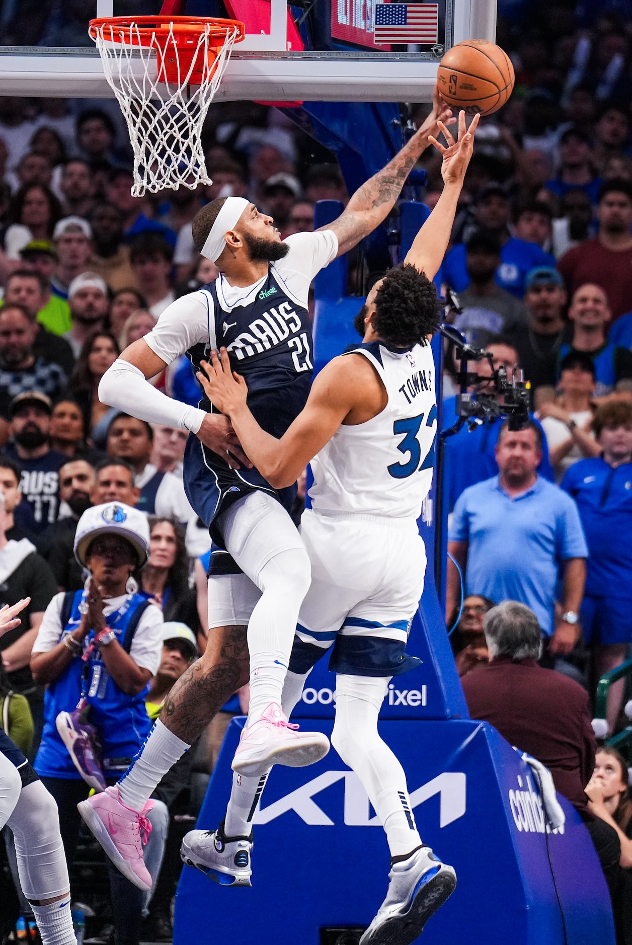 Dallas Mavericks center Daniel Gafford (21) blocks a shot by Minnesota Timberwolves center...