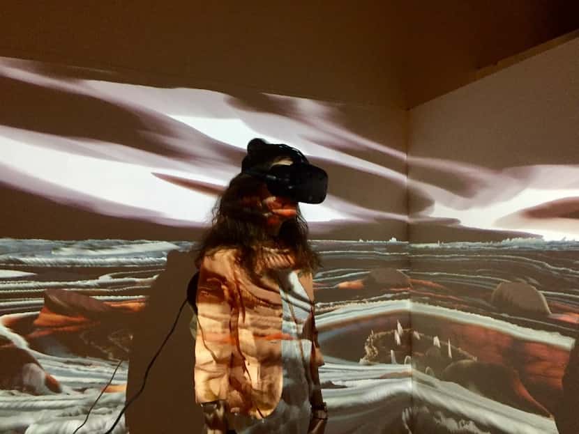 A patron at the 2017 Currents New Media Festival in Santa Fe experiences Vesica Pisces,...