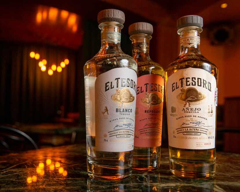 A trio of El Tesoro tequila bottles are photographed at the Midnight Rambler located inside...