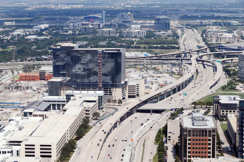 Dallas North Tollway splits Legacy West (left) and Shops of Legacy (right) in Plano, Texas...
