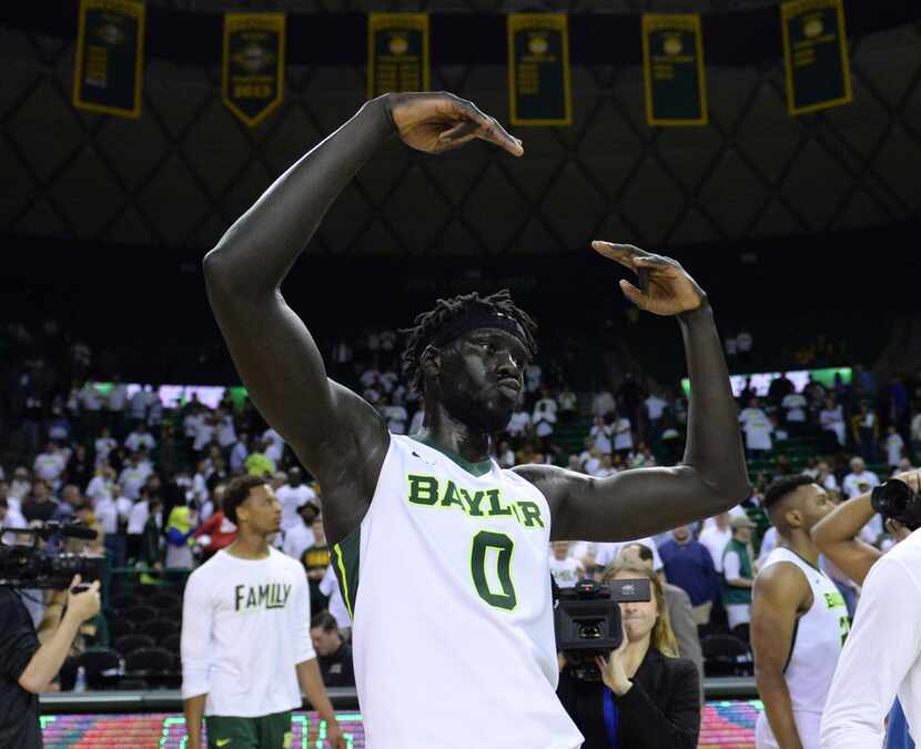 Baylor forward Jo Lual-Acuil Jr. gestures after the team's 87-64 win over Oklahoma in an...
