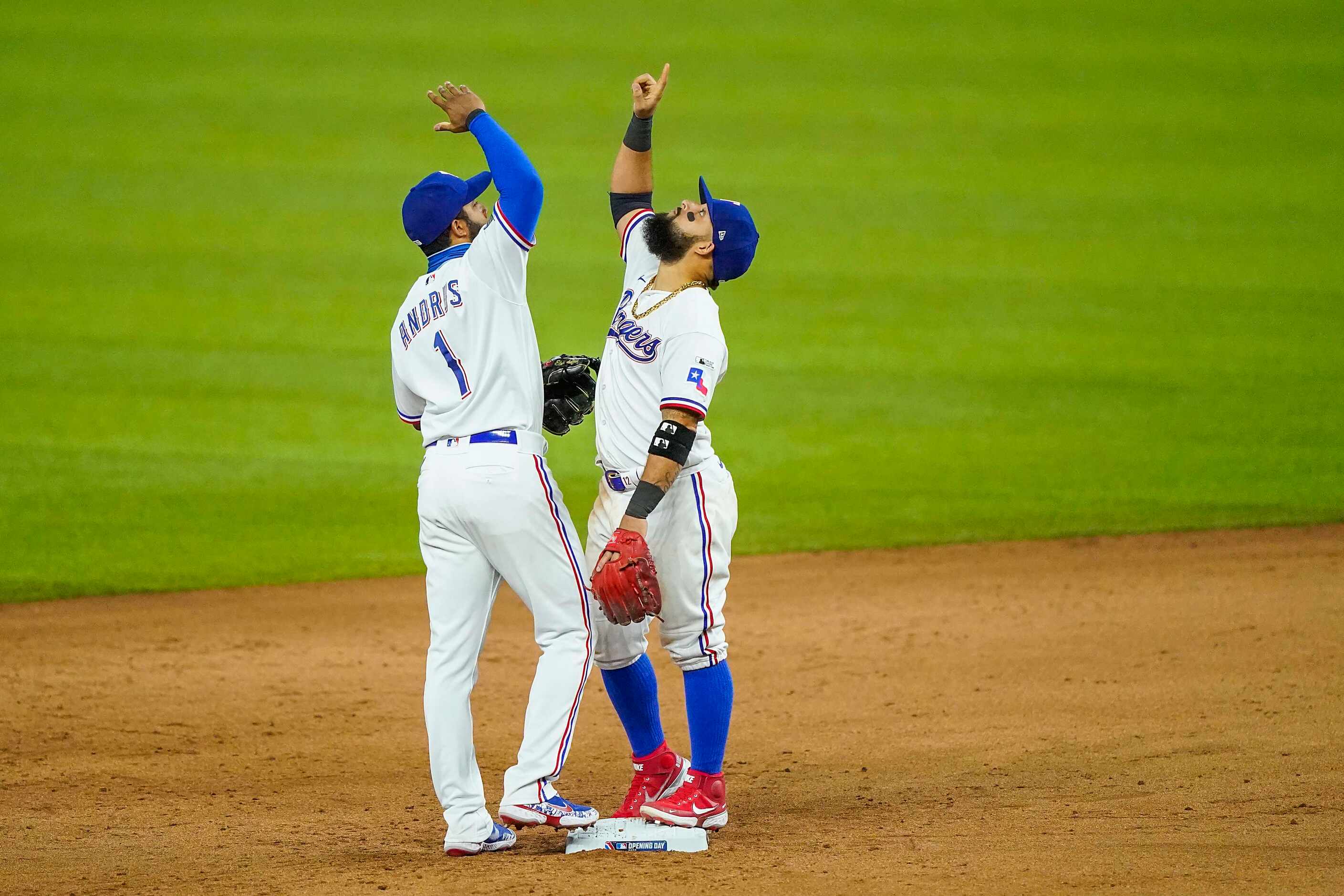 Texas Rangers shortstop Elvis Andrus and second baseman Rougned Odor celebrate after a 1-0...