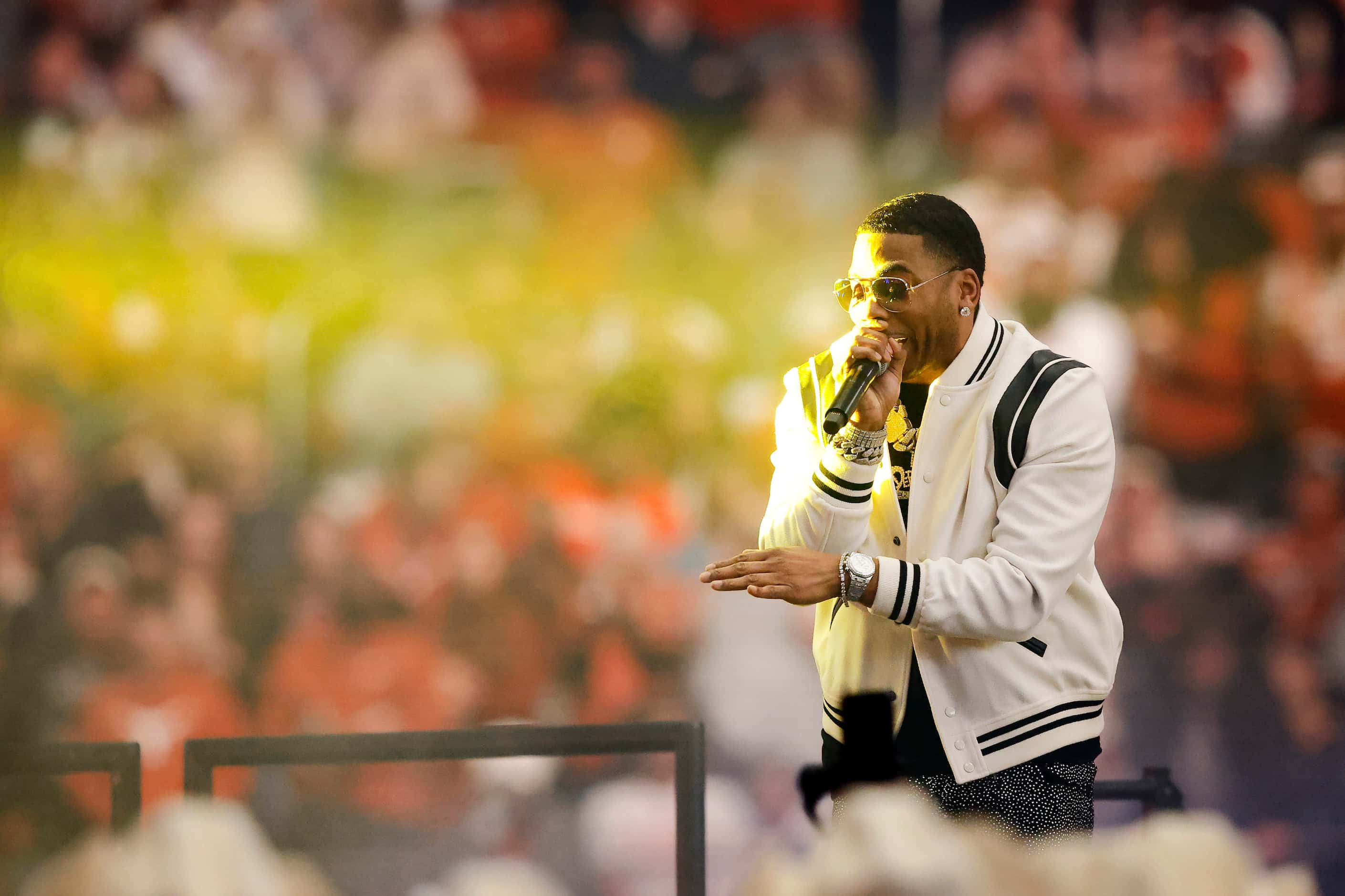 Entertainer Nelly performed during halftime of the Big 12 Championship football game at AT&T...
