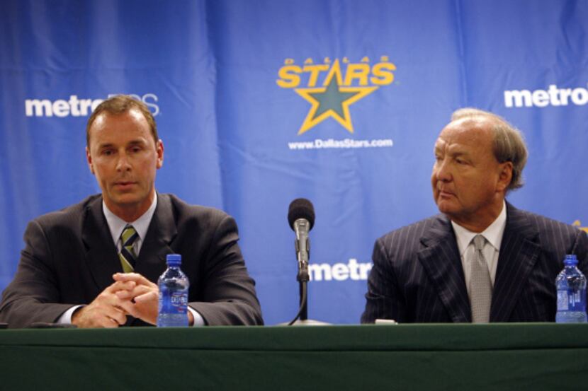 Joe Nieuwendyk (left) addresses the media as Stars owner Tom Hicks looks on during a press...