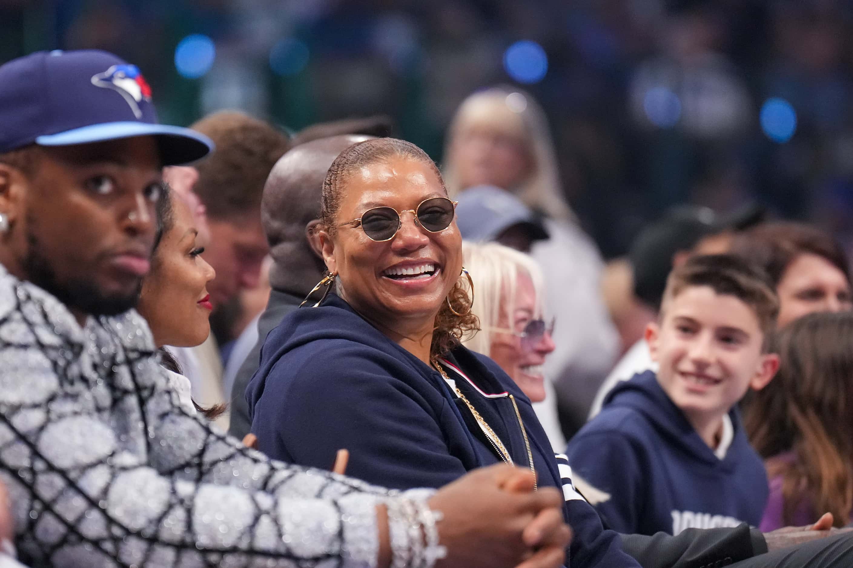 Queen Latifah sits courtside during the first half in Game 3 of the NBA basketball Western...