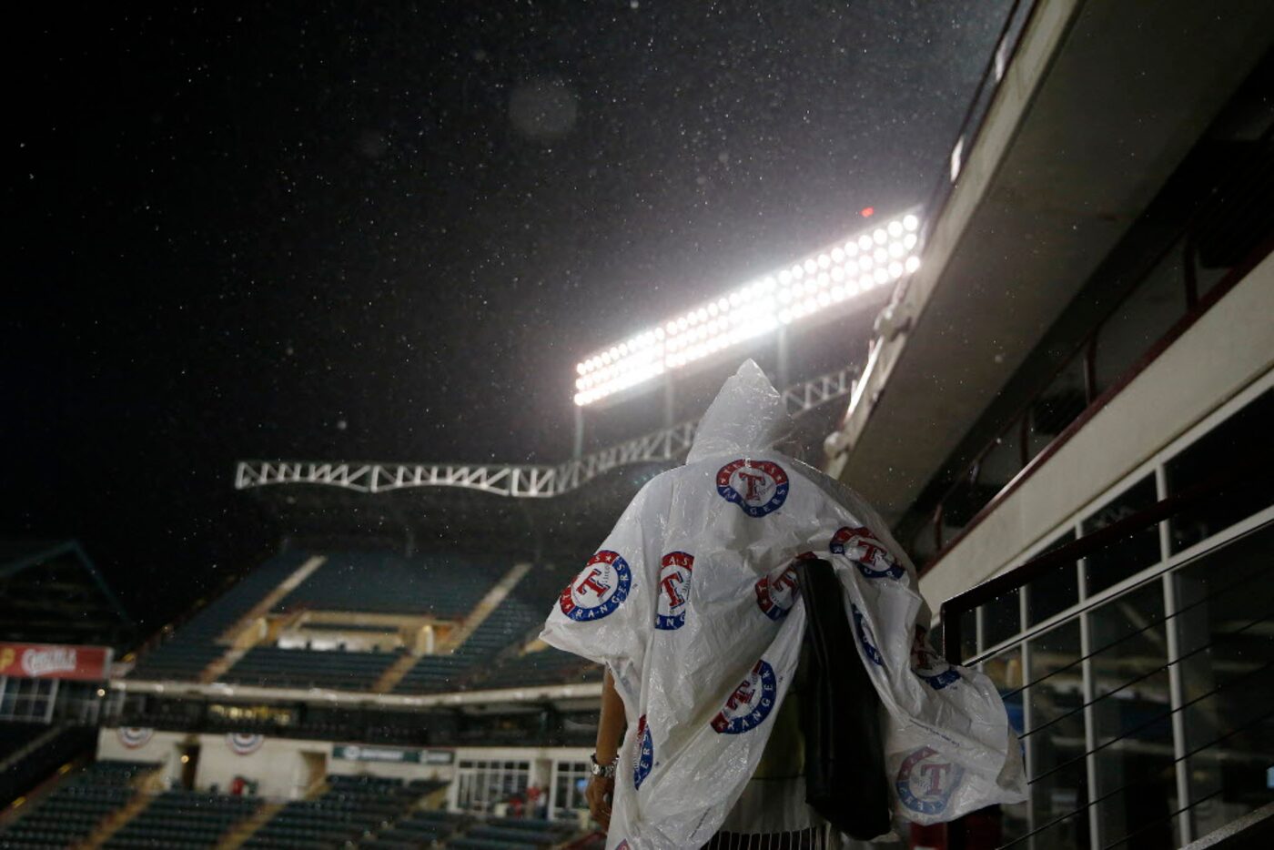 A country music fan walked into a tunnel to stay covered as strong wind, rain and lightning...