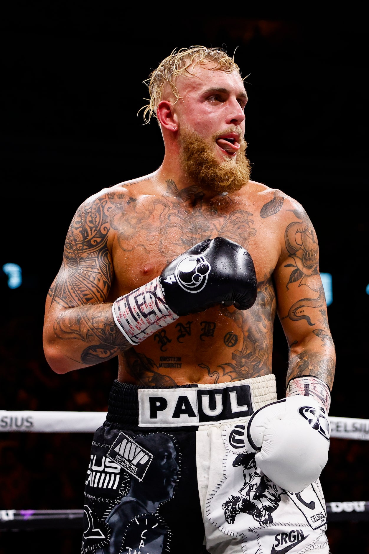 Jake Paul taunts Nate Diaz, not pictured, during a boxing match in Dallas, Saturday, August...