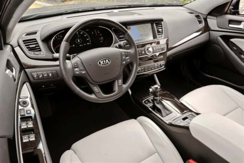 Inside the 2014 Kia Cadenza, the center stack and its navigation screen were more subtle...