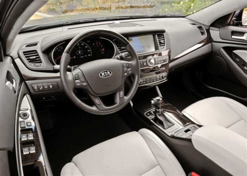 Inside the 2014 Kia Cadenza, the center stack and its navigation screen were more subtle...