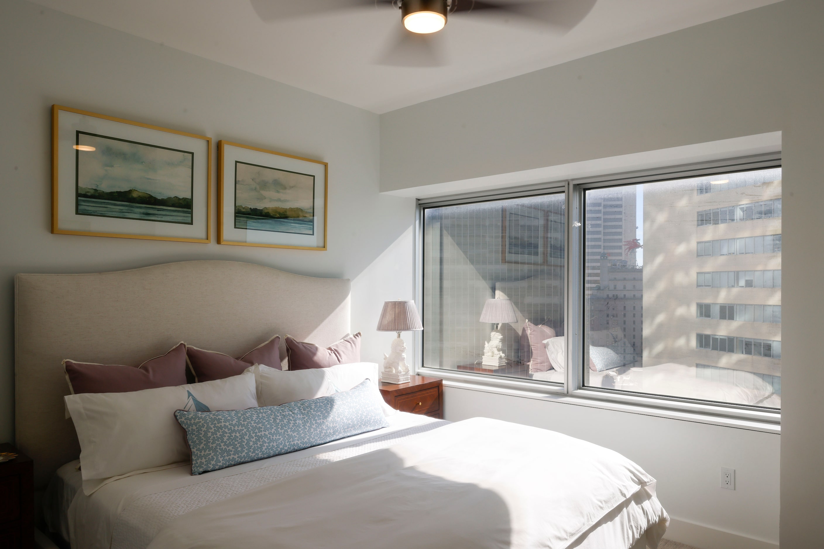 A bedroom of a two-bedroom residential space at the newly renovated Energy Plaza office...