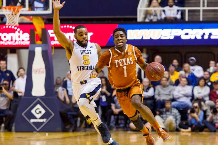 Jan 20, 2016; Morgantown, WV, USA; Texas Longhorns guard Isaiah Taylor (1) dribbles past...