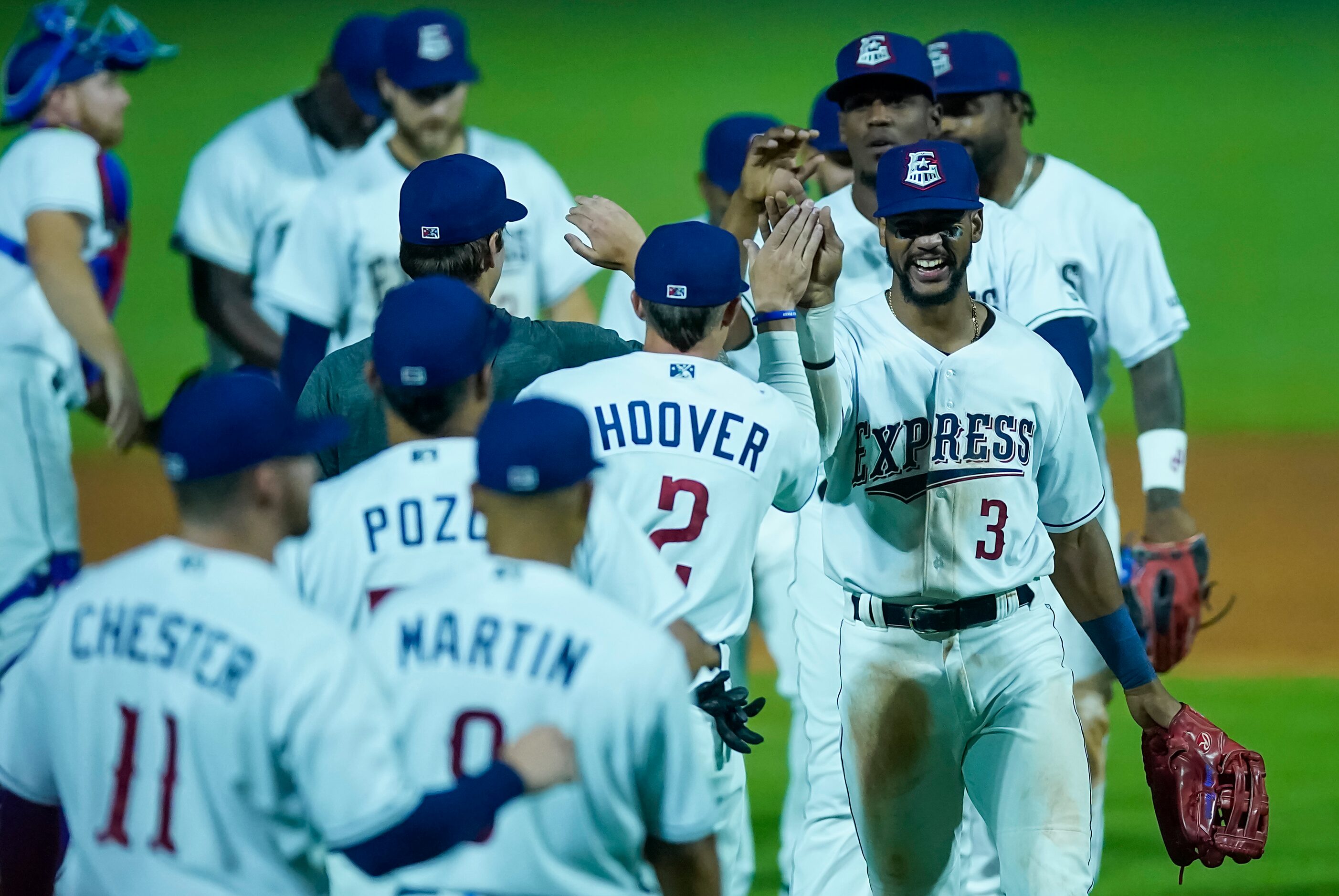 Round Rock Express outfielder Leody Taveras (3) celebrates with infielder Jake Hoover after...