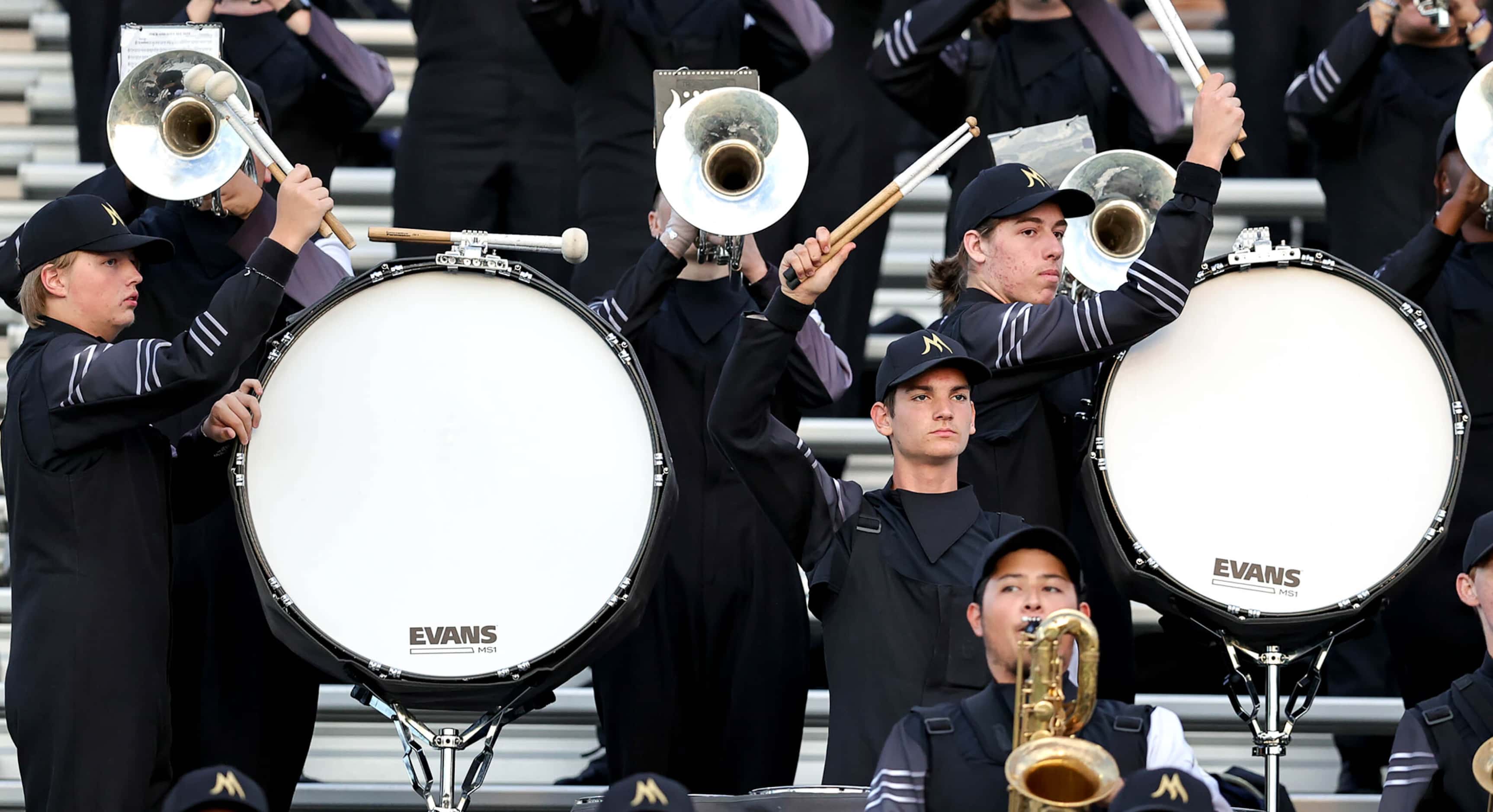 The Mansfield band performs before the game against Cedar Hill in a District 11-6A high...