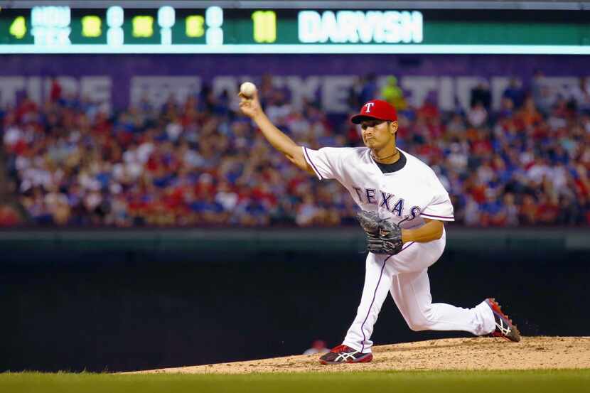 ARLINGTON, TX - APRIL 11:  Yu Darvish #11 of the Texas Rangers pitches against the Houston...