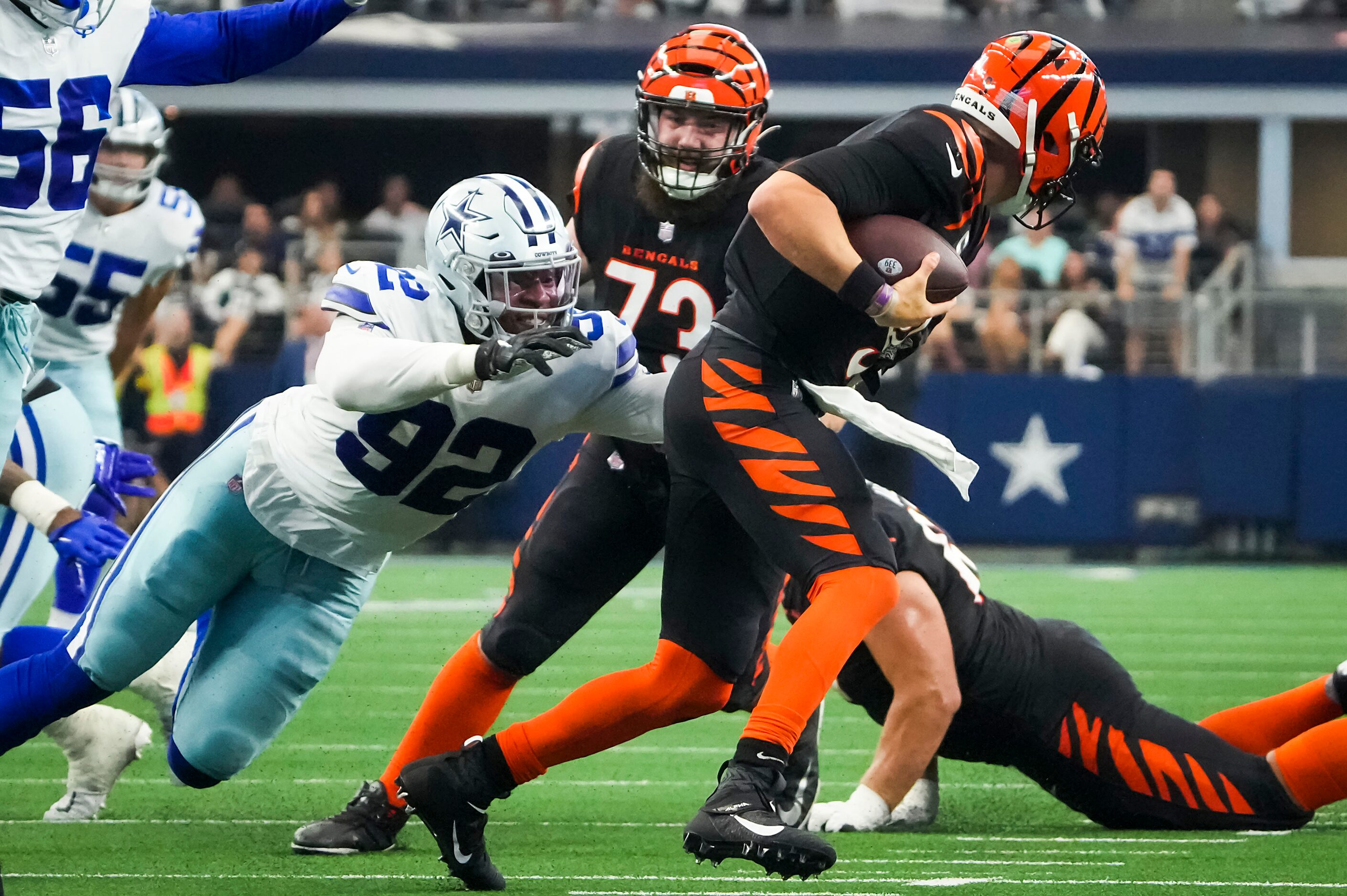 Dallas Cowboys defensive end Dorance Armstrong (92) sacks Cincinnati Bengals quarterback Joe...