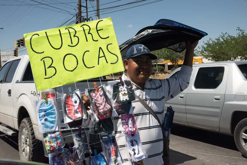 Street vendors at traffic lights throughout Ciudad Juarez have swapped their usual stock of...