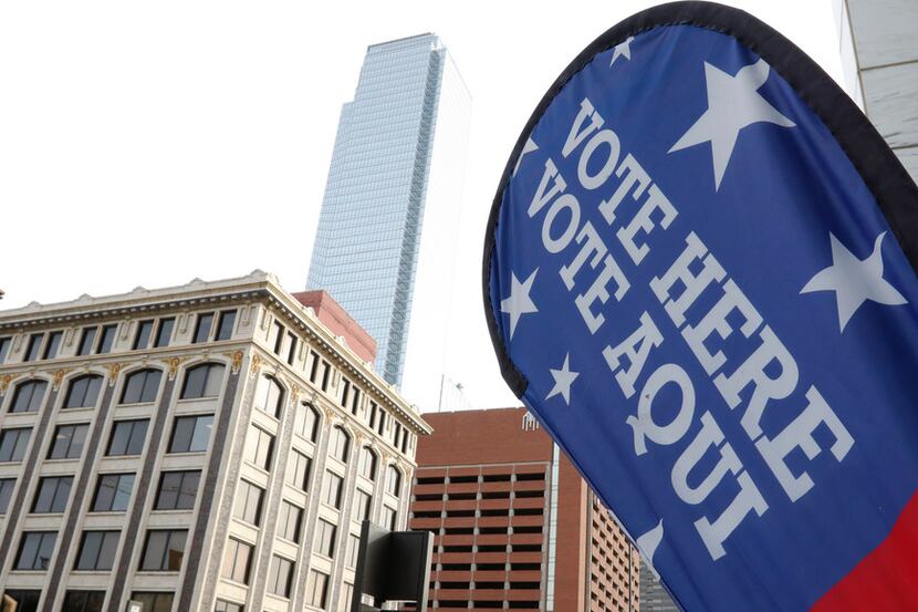A sign marks an early-voting location at the George L. Allen, Sr. Courts Building in Dallas,...