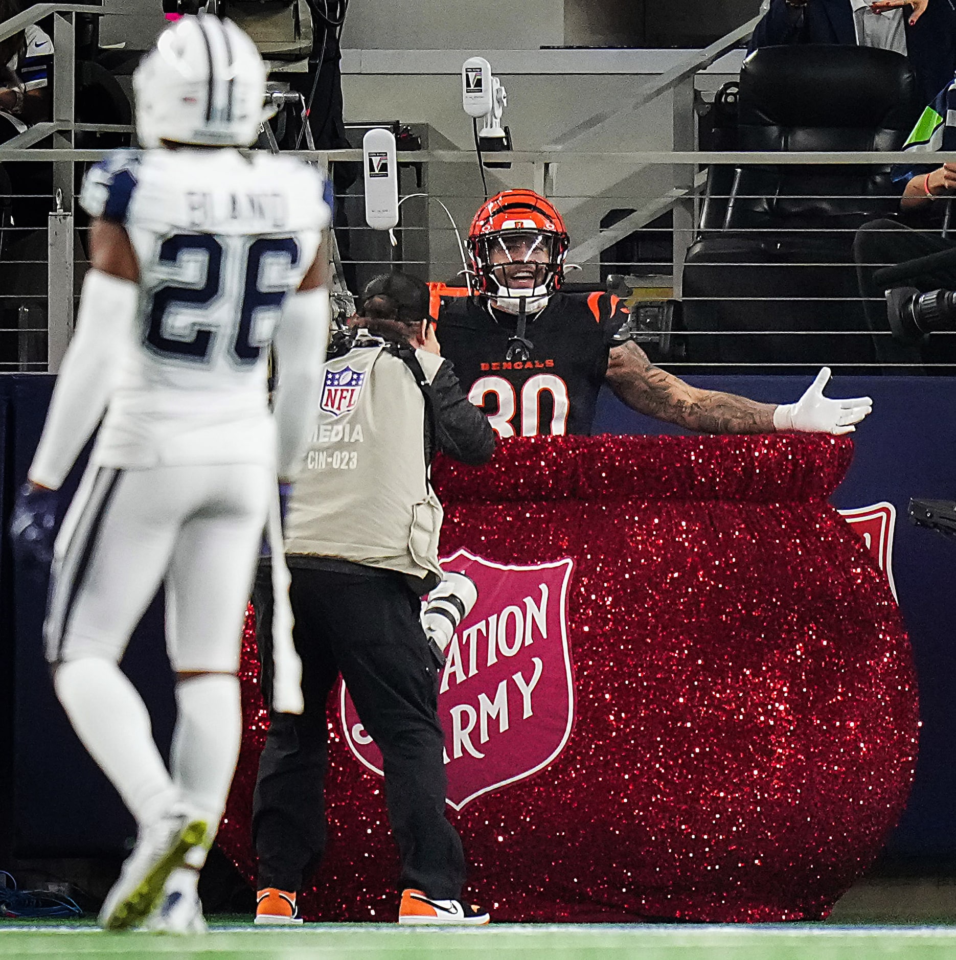 Cincinnati Bengals running back Chase Brown (30) celebrates a touchdown as Dallas Cowboys...