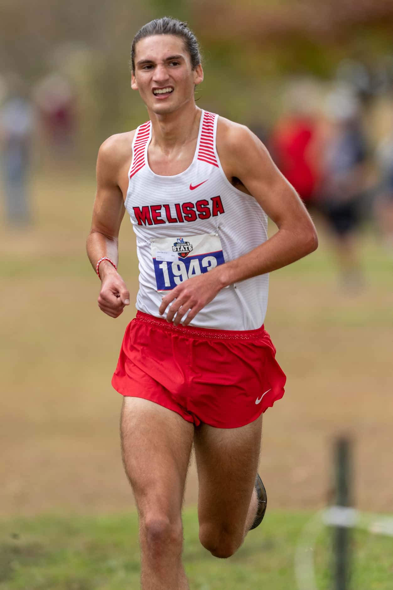 Melissa's Judson Greer (1943) finishes first in the boys UIL Class 4A state cross country...