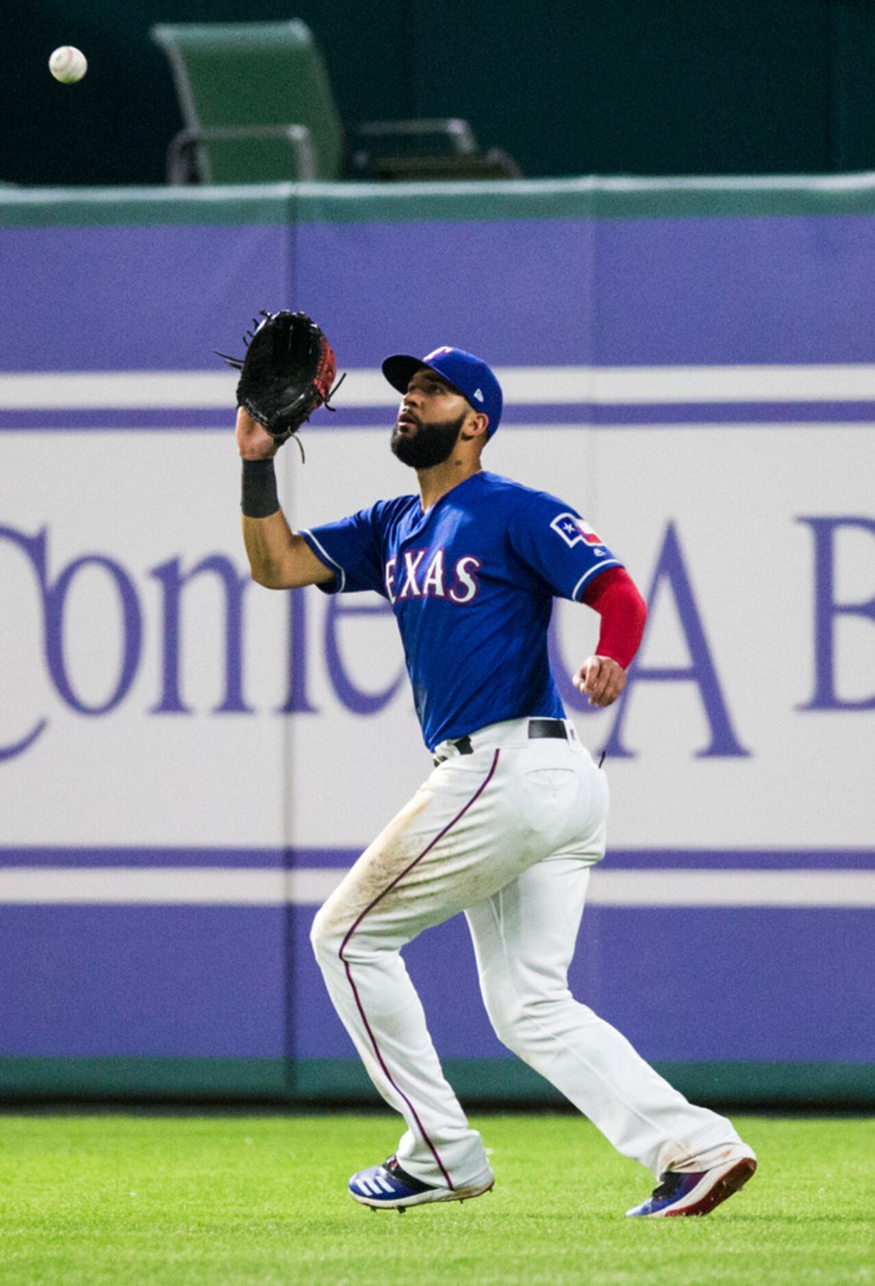 Texas Rangers right fielder Nomar Mazara (30) makes a catch in center field to end the game...