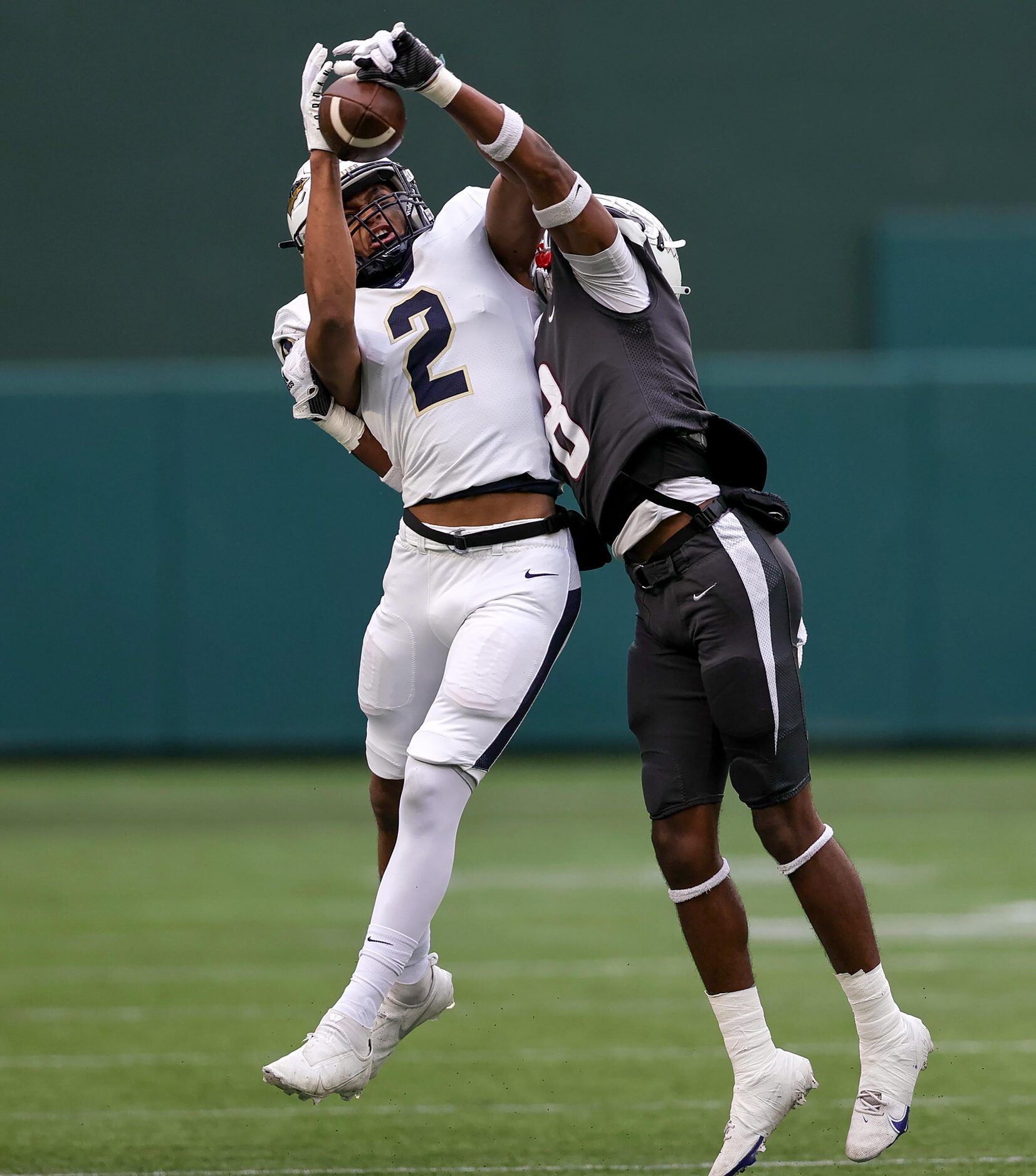 Keller wide receiver Tre' Griffiths (2) tries to come up with a reception against Lewisville...