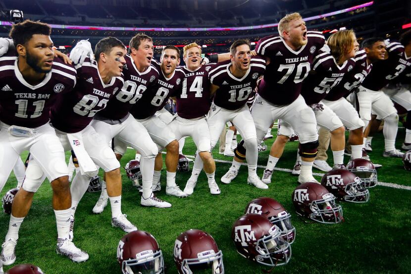 Texas A&M Aggies quarterback Trevor Knight (8) joined his tufter defeating Arkansas...