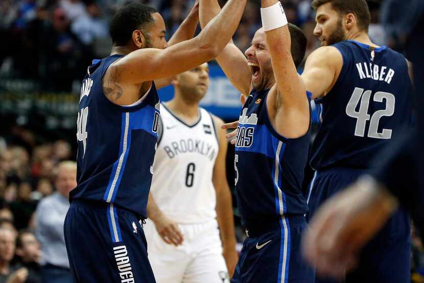 The Mavericks' reserves, spearheaded by J.J. Barea (right) and Devin Harris helped decimate...