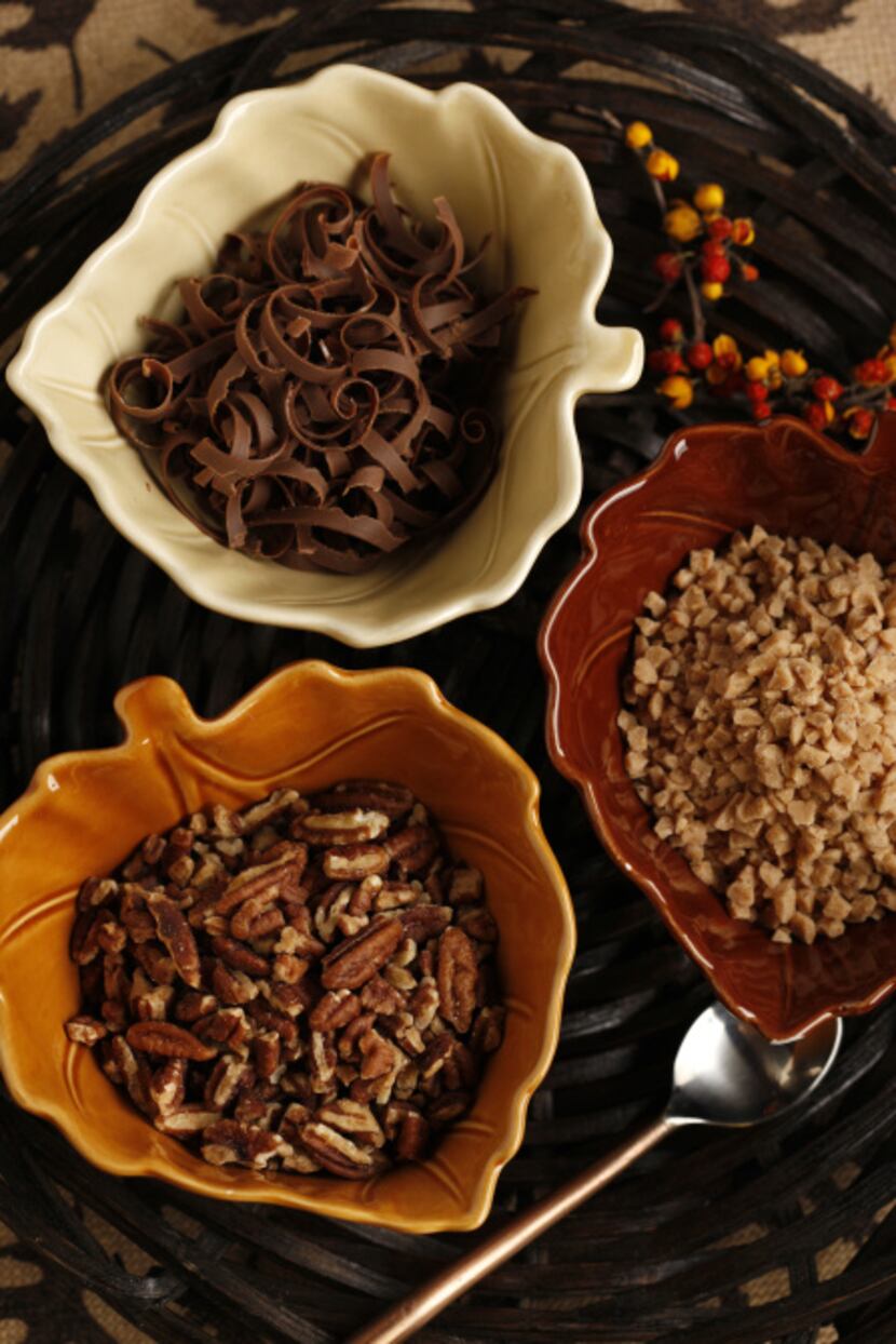 Thanksgiving Desserts, photographed October 31, 2012. Toppings for Pumkin Pie, clockwise...