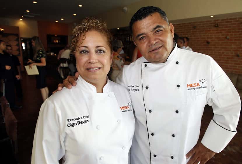 Owners (and Executive Chefs) Olga and Raul Reyes pose inside their restaurant Mesa, a small,...