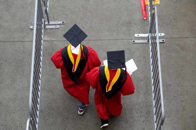 New graduates walk into the High Point Solutions Stadium before the start of the Rutgers...