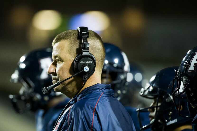 Allen head coach Tom Westerberg  watches from the sidelines during the second quarter of a...