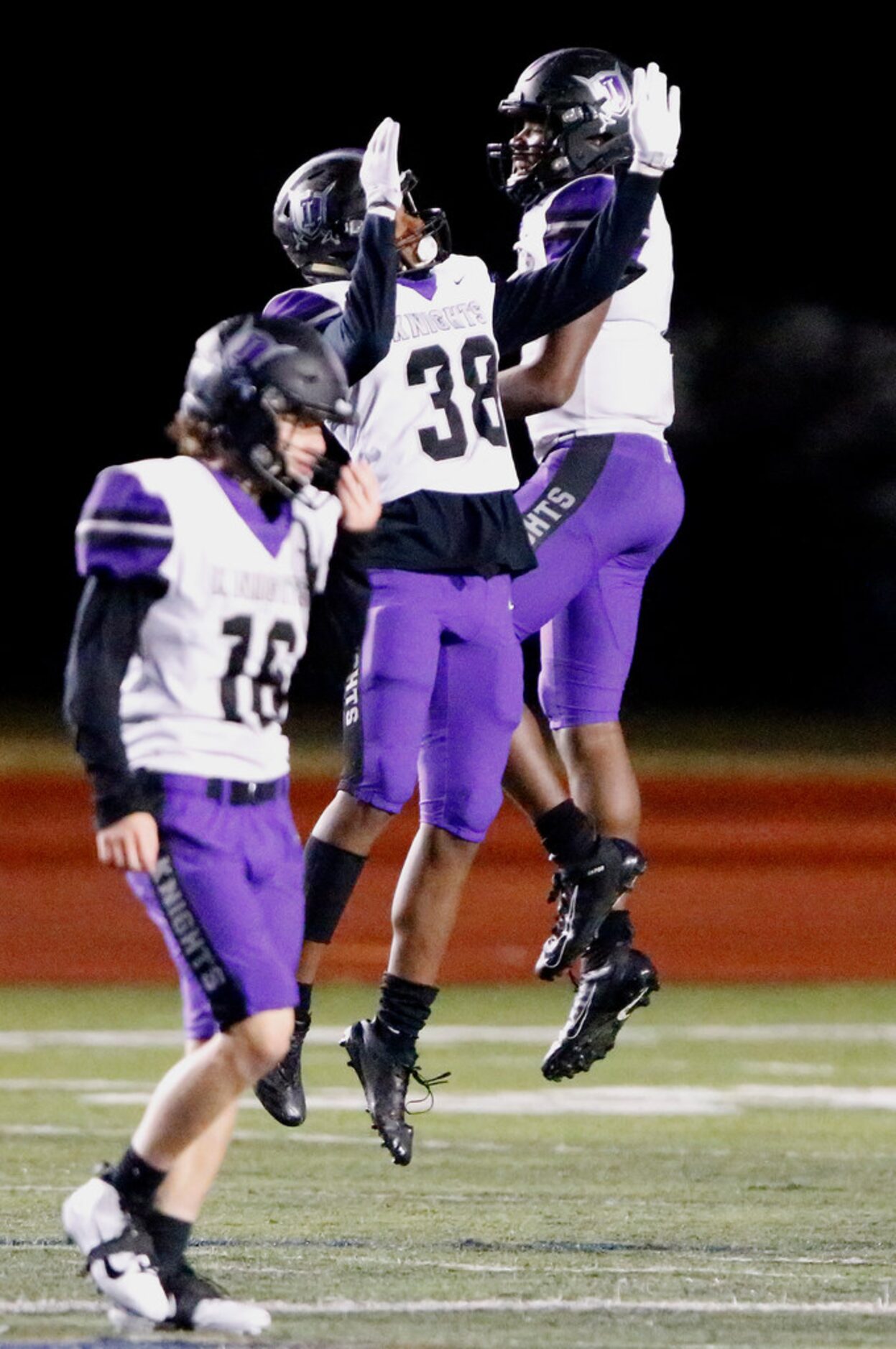 Independence High School wide receiver JD Cannida (38) and Independence High School...