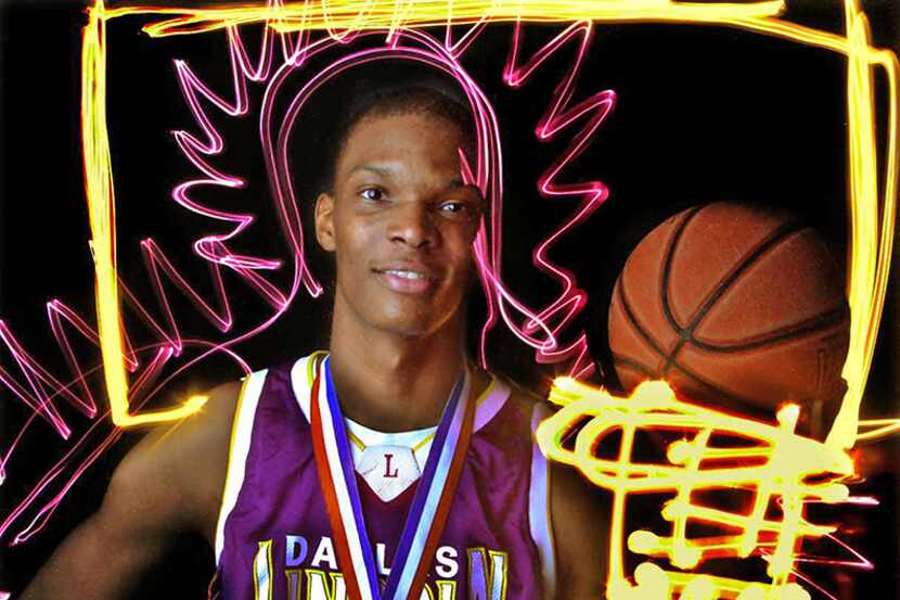  April 6, 2002--Dallas Lincoln High School basketball star Chris Bosh is photographed in the...