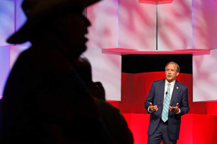 Texas Attorney General Ken Paxton talks with the crowd during the 2018 Texas GOP Convention...