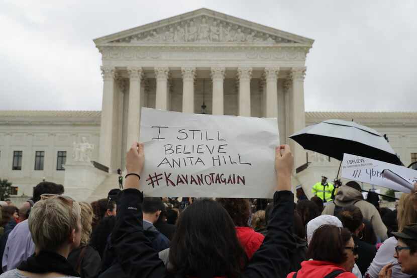 Protesters rally in front of the Supreme Court while demonstrating against the confirmation...