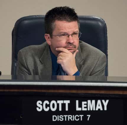 Garland City Council member Scott LeMay listens as another member discusses an agenda item...