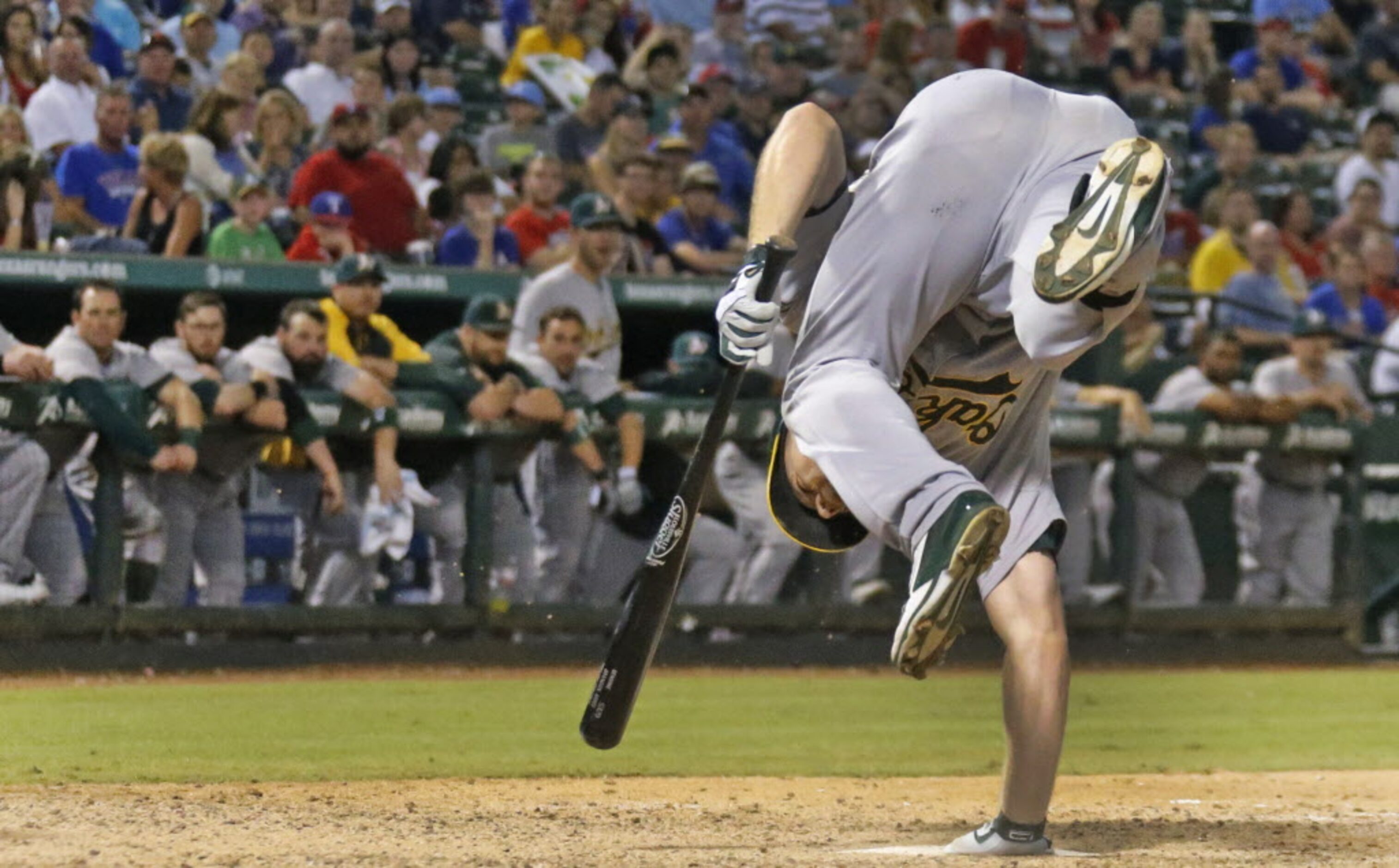 Oakland's Brandon Moss (37) jumps out of the way of an inside pitch in the eighth inning...