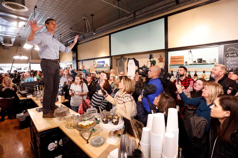 Former Texas congressman Beto O'Rourke speaks to local residents during a meet-and-greet at...