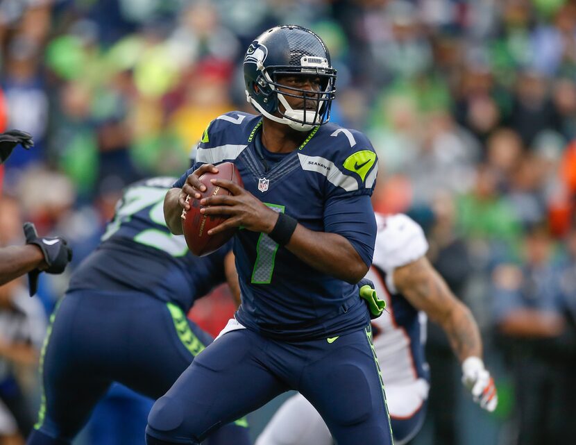 SEATTLE, WA - AUGUST 14:  Quarterback Tarvaris Jackson #7 of the Seattle Seahawks looks...