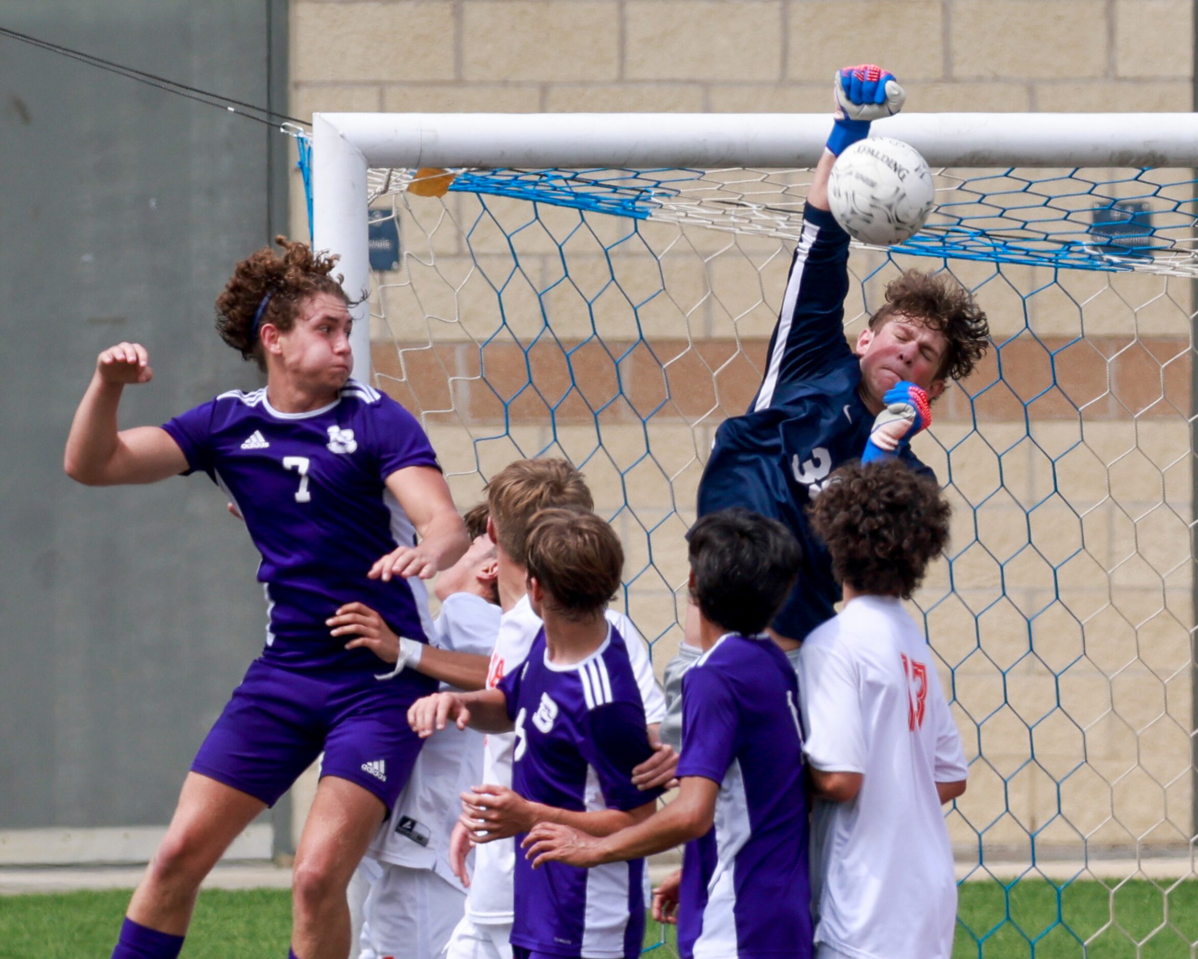 Celina goalkeeper Nathan Yost (35) clears the ball away after a corner kick during the first...