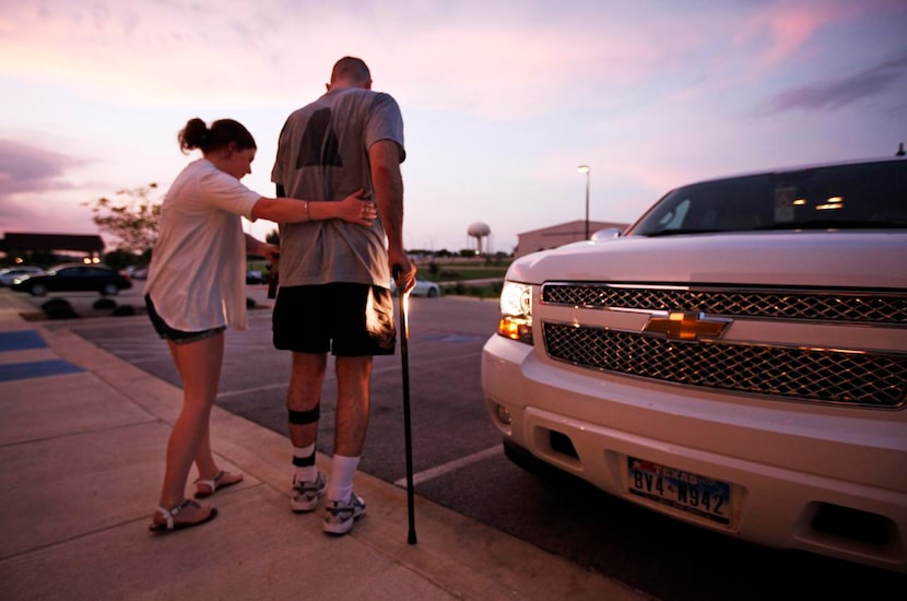 Jessica Hansen helped fiance Staff Sgt. Patrick Zeigler to their car outside the Shilo Inn...