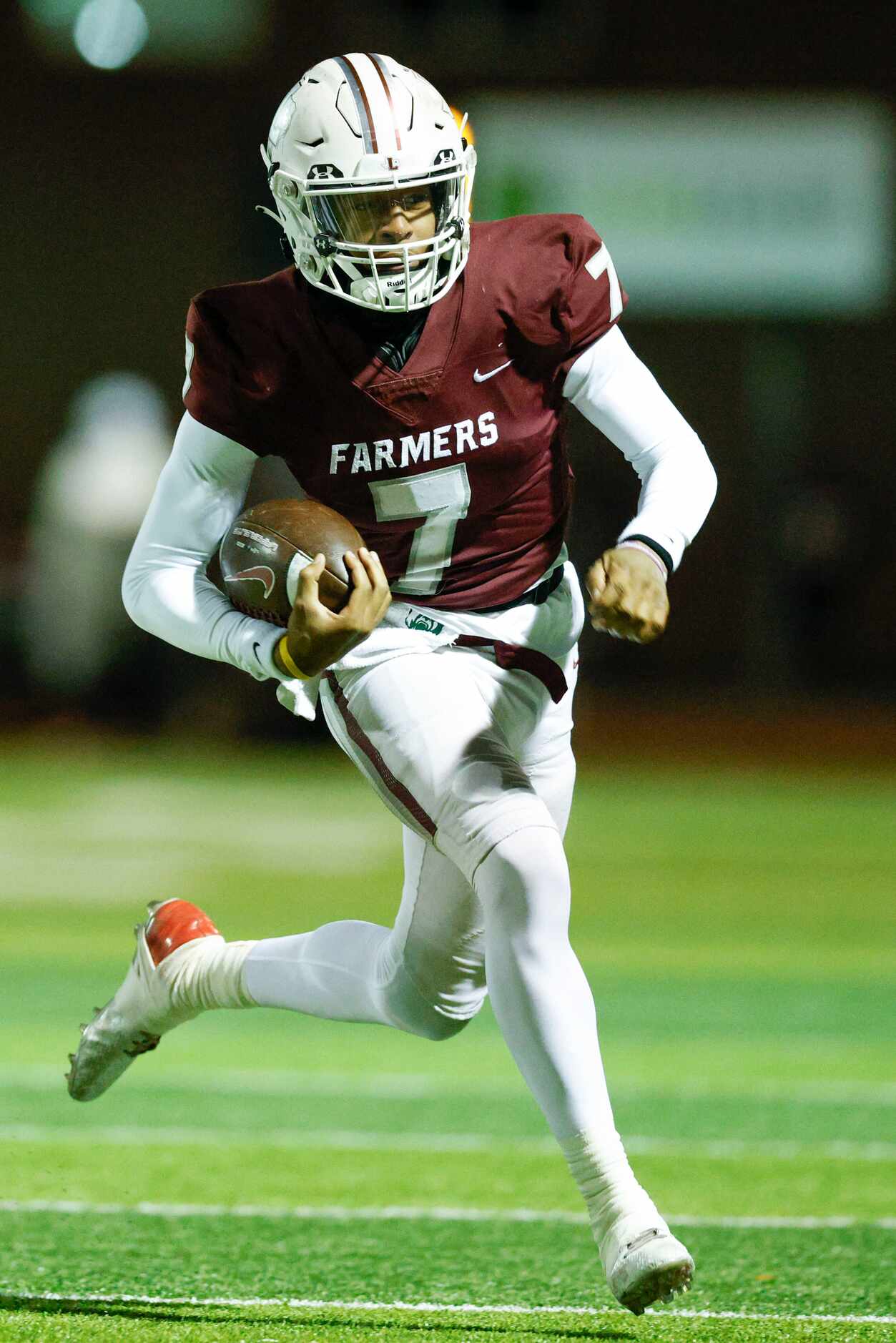 Lewisville quarterback Ethan Terrell (7) runs the ball during the first half of a Class 6A...