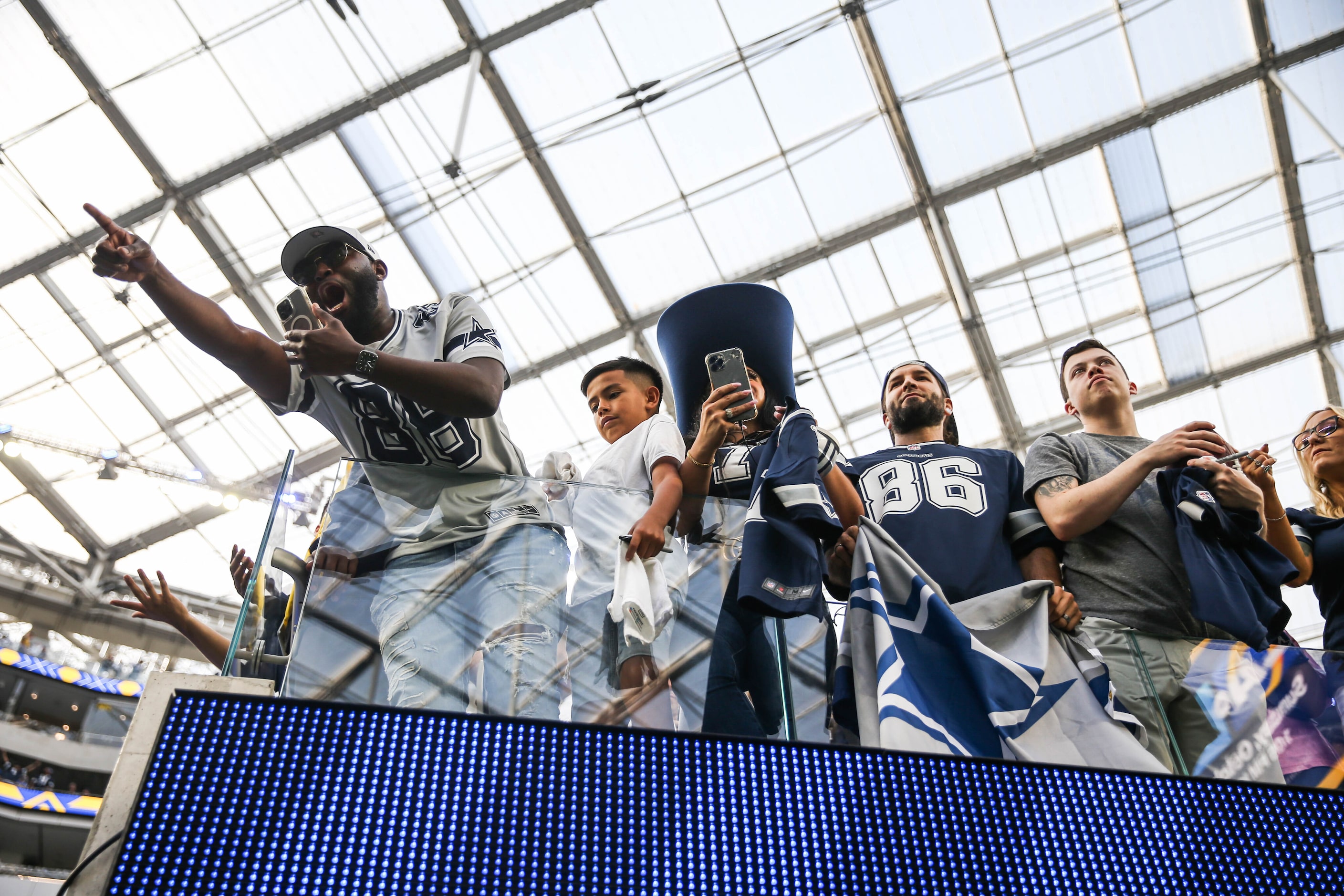 Dallas Cowboys fans celebrate the team after win the game against Los Angeles Rams at the...