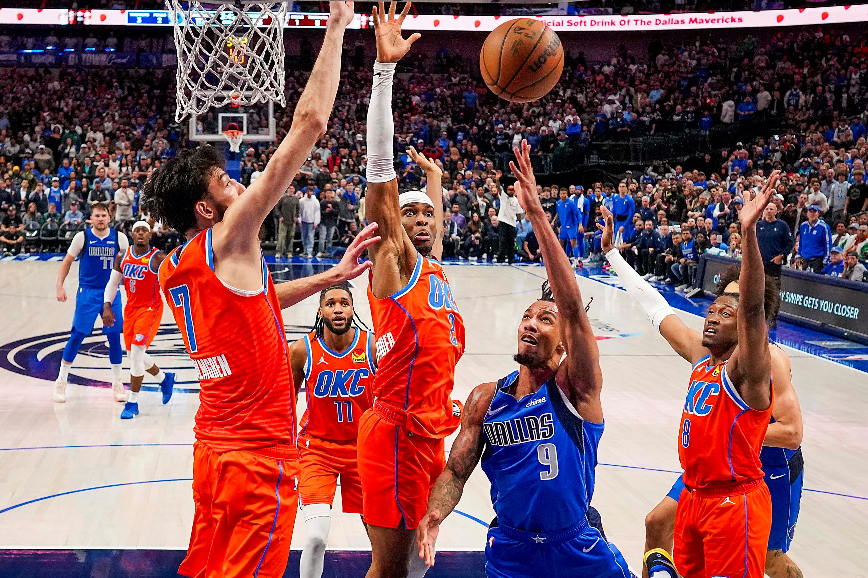 Dallas Mavericks guard A.J. Lawson (9) drives to the basket against Oklahoma City Thunder...