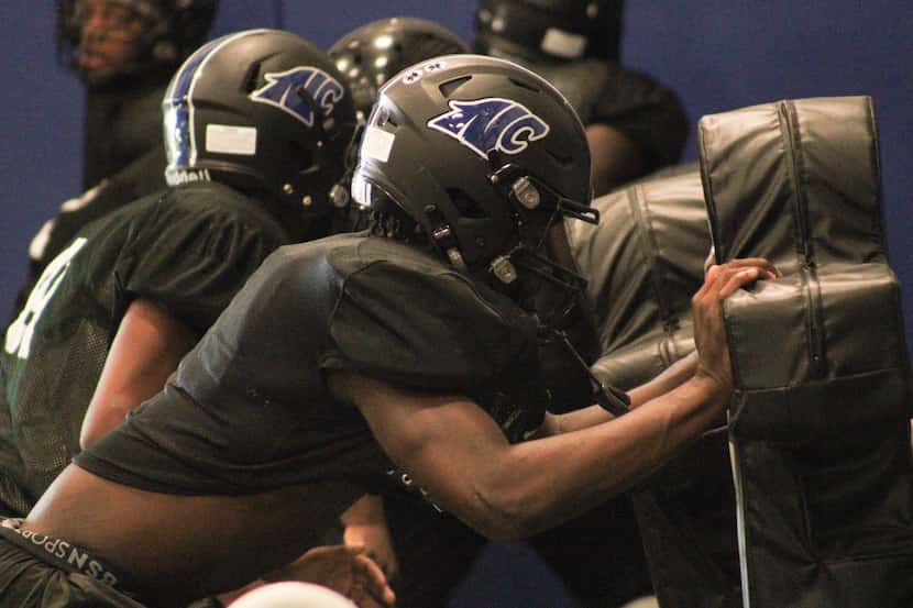 North Crowley football players practice on Monday, Sept. 12. North Crowley's defense is one...
