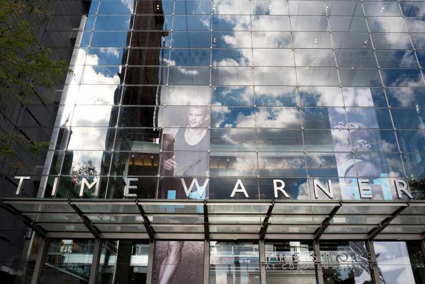 The Justice Department is suing to block Dallas-based AT&tT's takeover of Time Warner.
